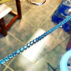 14k blue topaz tennis bracelet